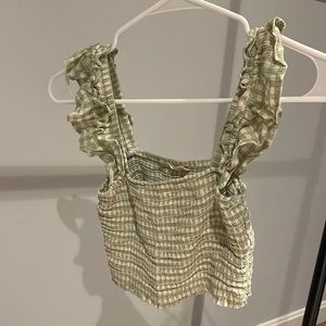 I am selling green and white cropped tank top from alter’d state in size small.